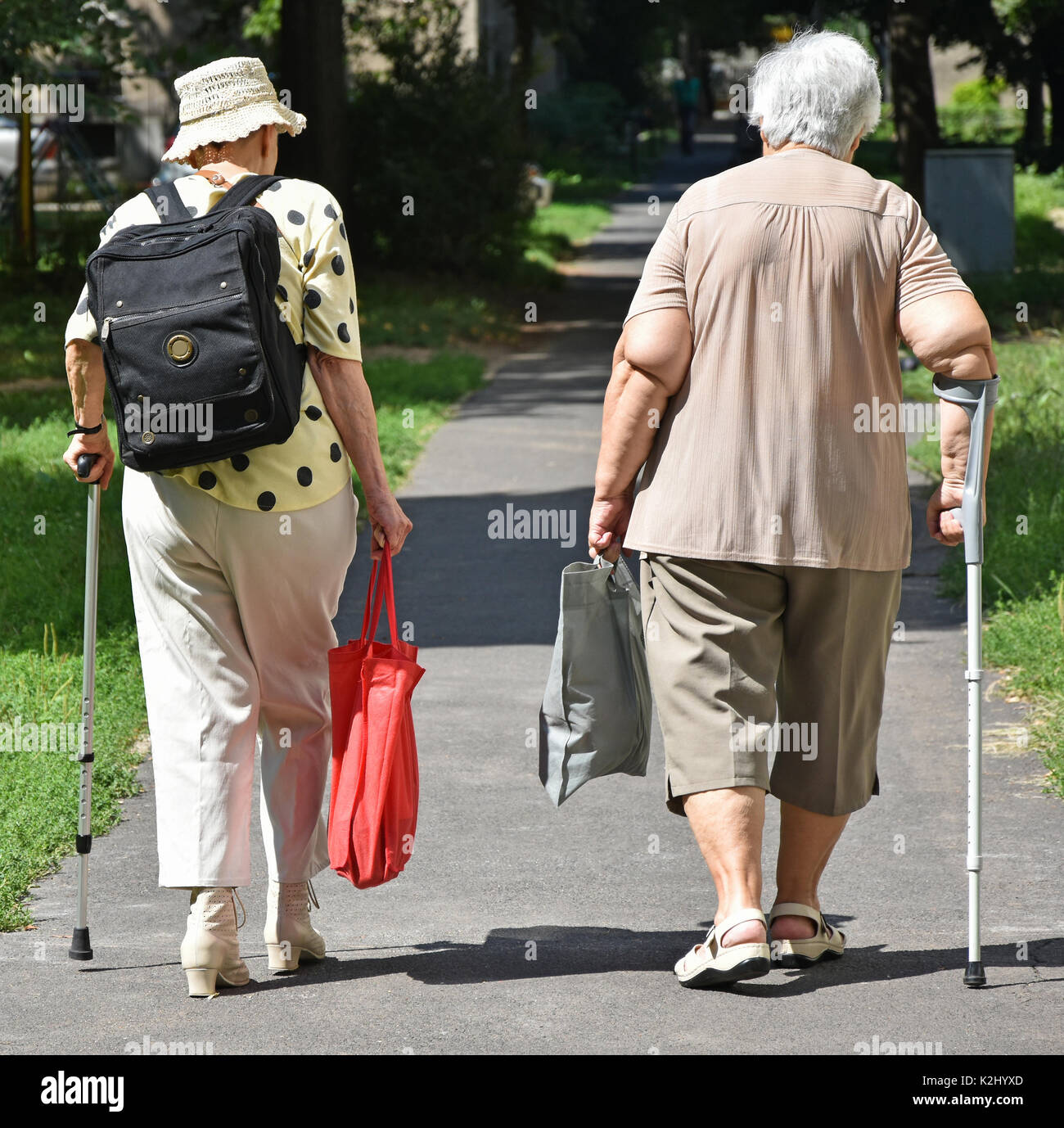 Old woman walk hi-res stock photography and images - Alamy