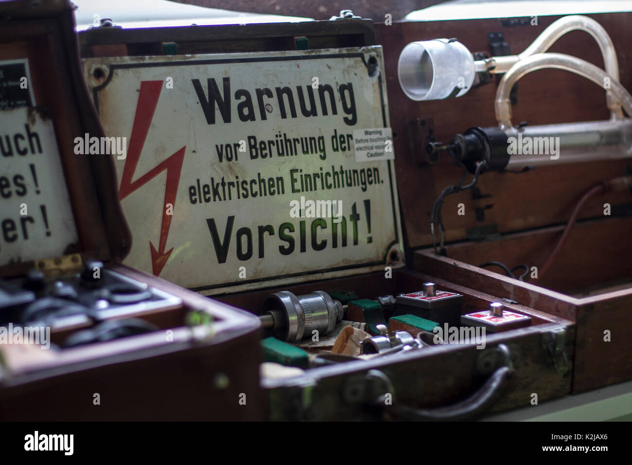 Old fashioned warning sign in German warnung vor berührung der