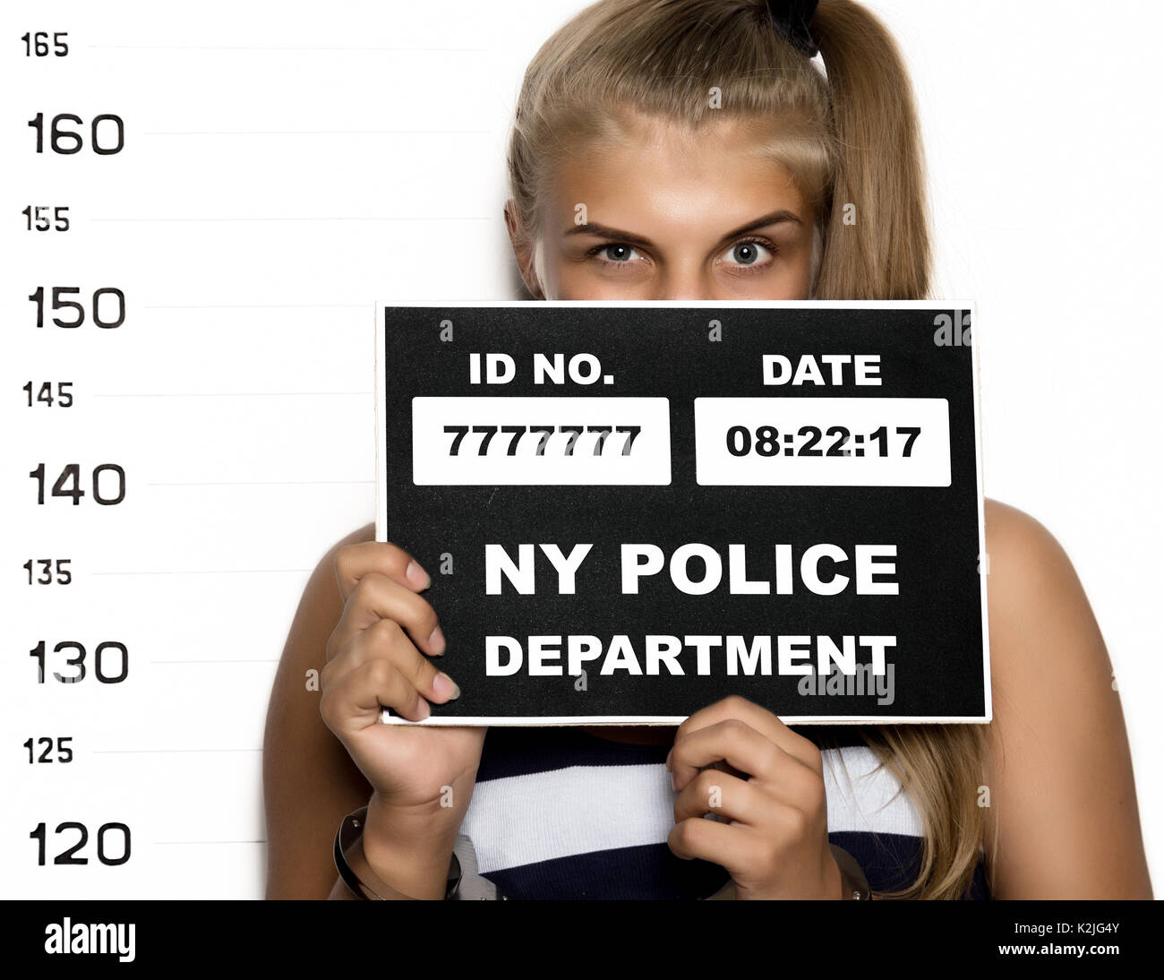 Young beautiful blonde woman Criminal Mug Shots Stock Photo