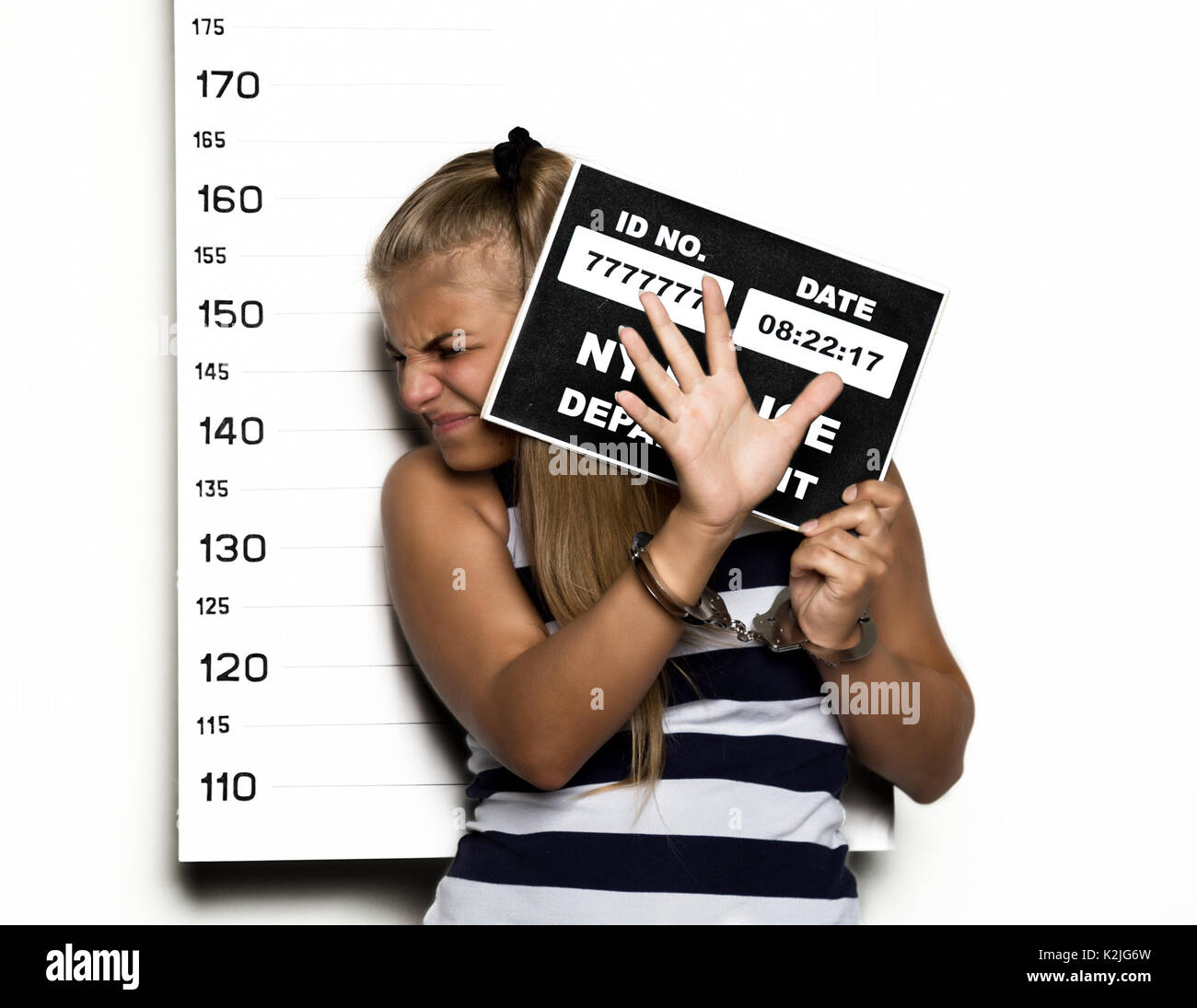Young beautiful blonde woman Criminal Mug Shots Stock Photo - Alamy