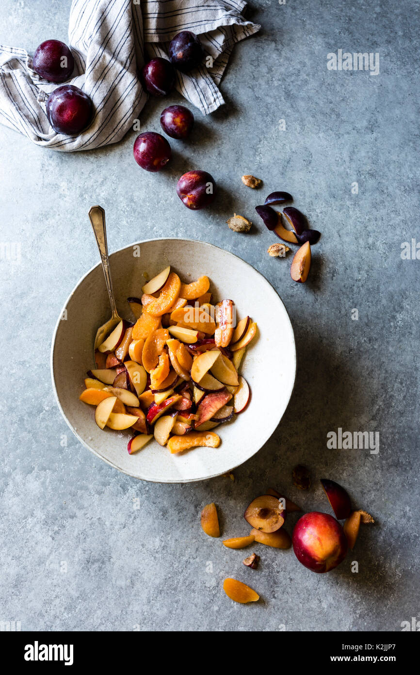 Peaches, Plums and nectarines being chopped for a dessert Stock Photo