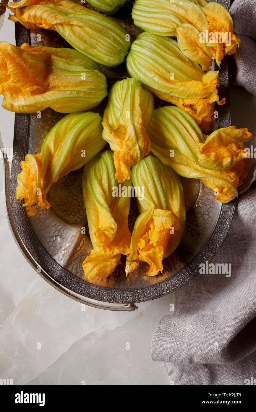 Zucchini, Squash flowers blossoms, an edible part of the plant Stock