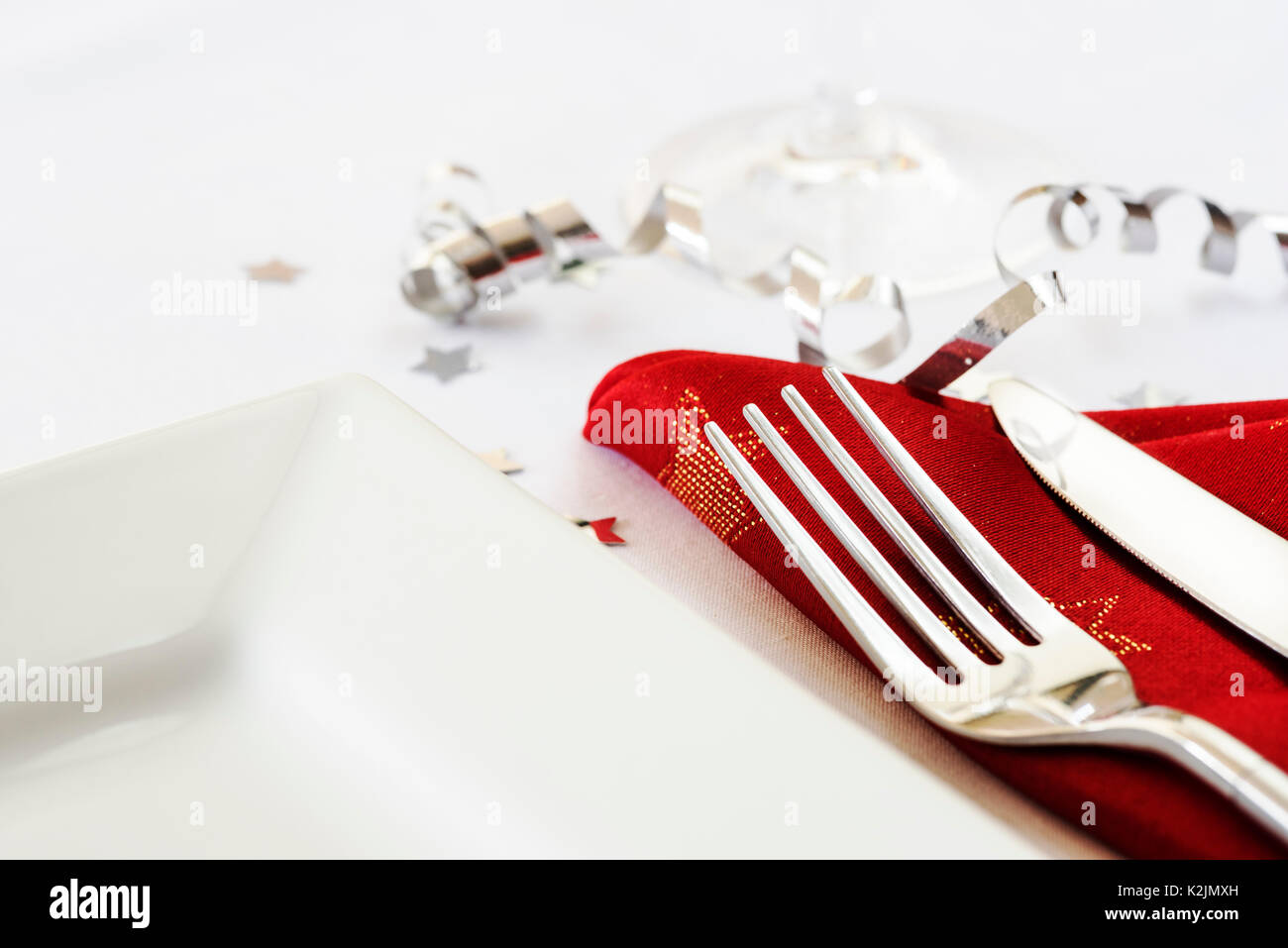 Single Plate Setting Single place table setting, knife fork plate, with festive decoration ...
