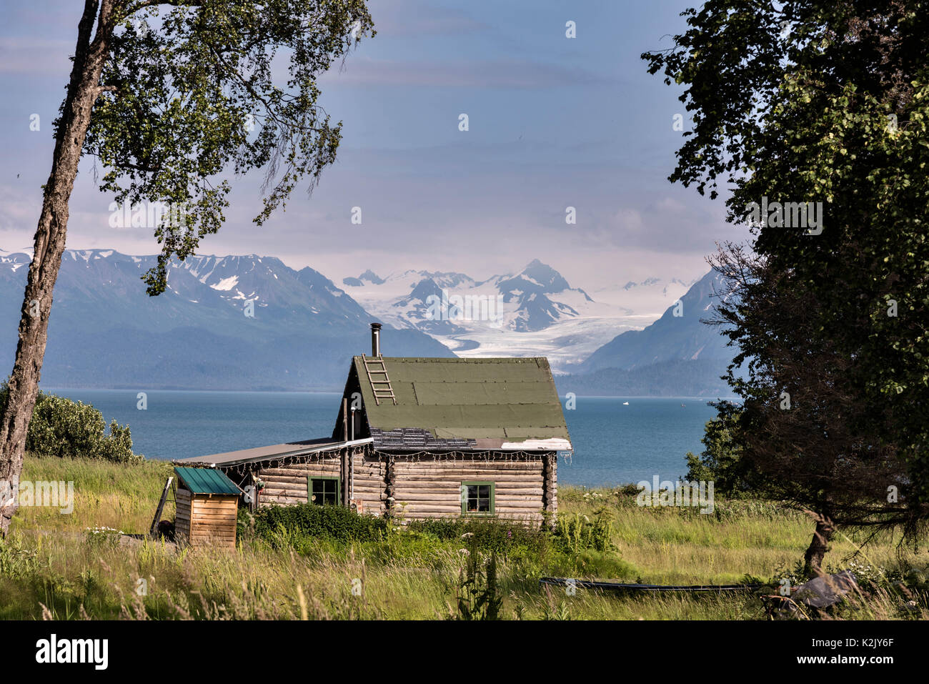 A homesteaders log cabin overlooking Kamishak Bay and the Kenai