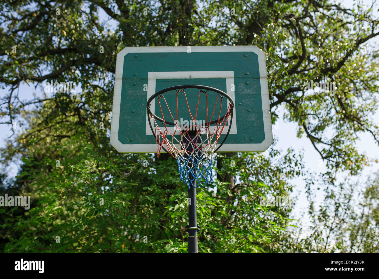 wooden green basketball basket outside Stock Photo Alamy