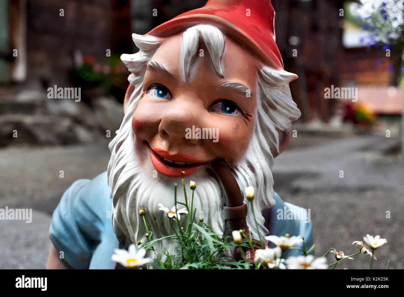 Gnome with pipe, Ulrichen, Switzerland. Stock Photo
