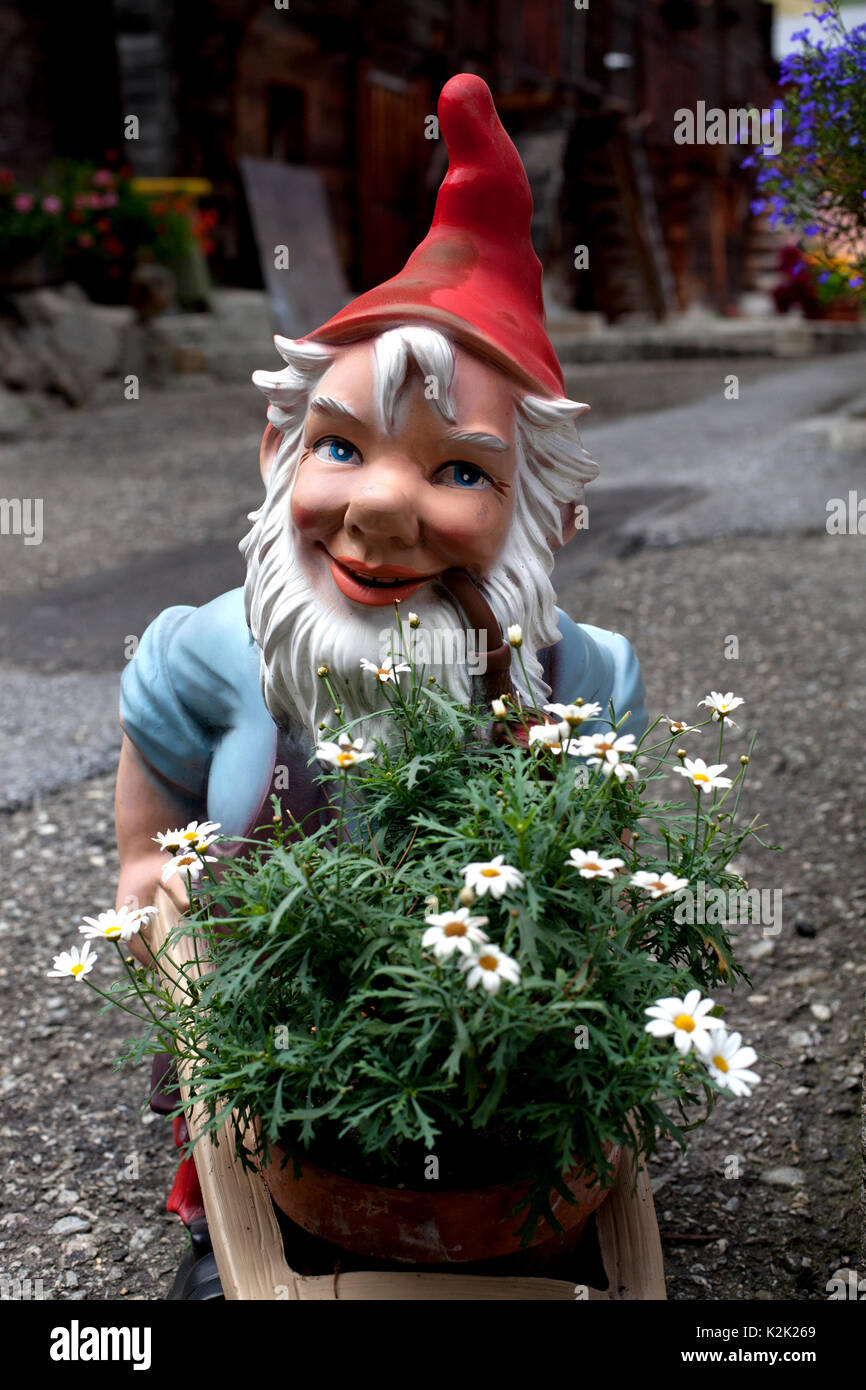 Gnome with pipe, Ulrichen, Switzerland. Stock Photo