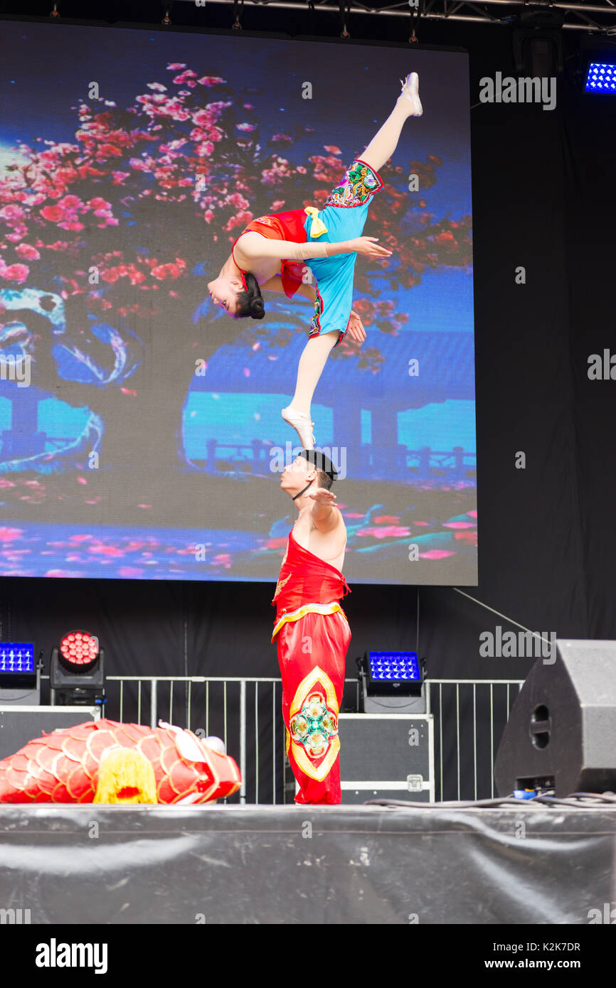 Chinese acrobats with Ballet on Shoulders at the China Festival 2017 in Cologne, Germany. Stock Photo