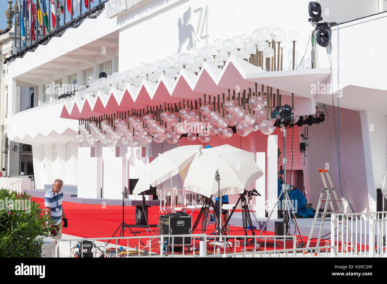 Lido, Venice, Italy. 30th Aug, 2017. Venues for the 2017 Film Festival after last minute preparations and installations and before the crowds arrive for the opening of the festival. The media setting up on the red carpet at the entrance to the Mostra Internazionale d'Arte Cinematografica. Stock Photo