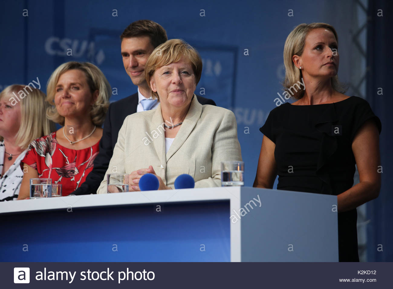 A very confident look as Angela Merkel views a large crowd in Erlangen Germany that had come to listen to her. She is currently on the campaign trail in the run up to the German election which is taking place on Sunday, September 24.Merkel spoke for over forty minutes and was well received though a small group of protestors tried to interrupt her speech with whistles and catcalls. She and her party the CDU and their Bavarian sister party the CSU,are ahead in the polls with 38.3 % Stock Photo