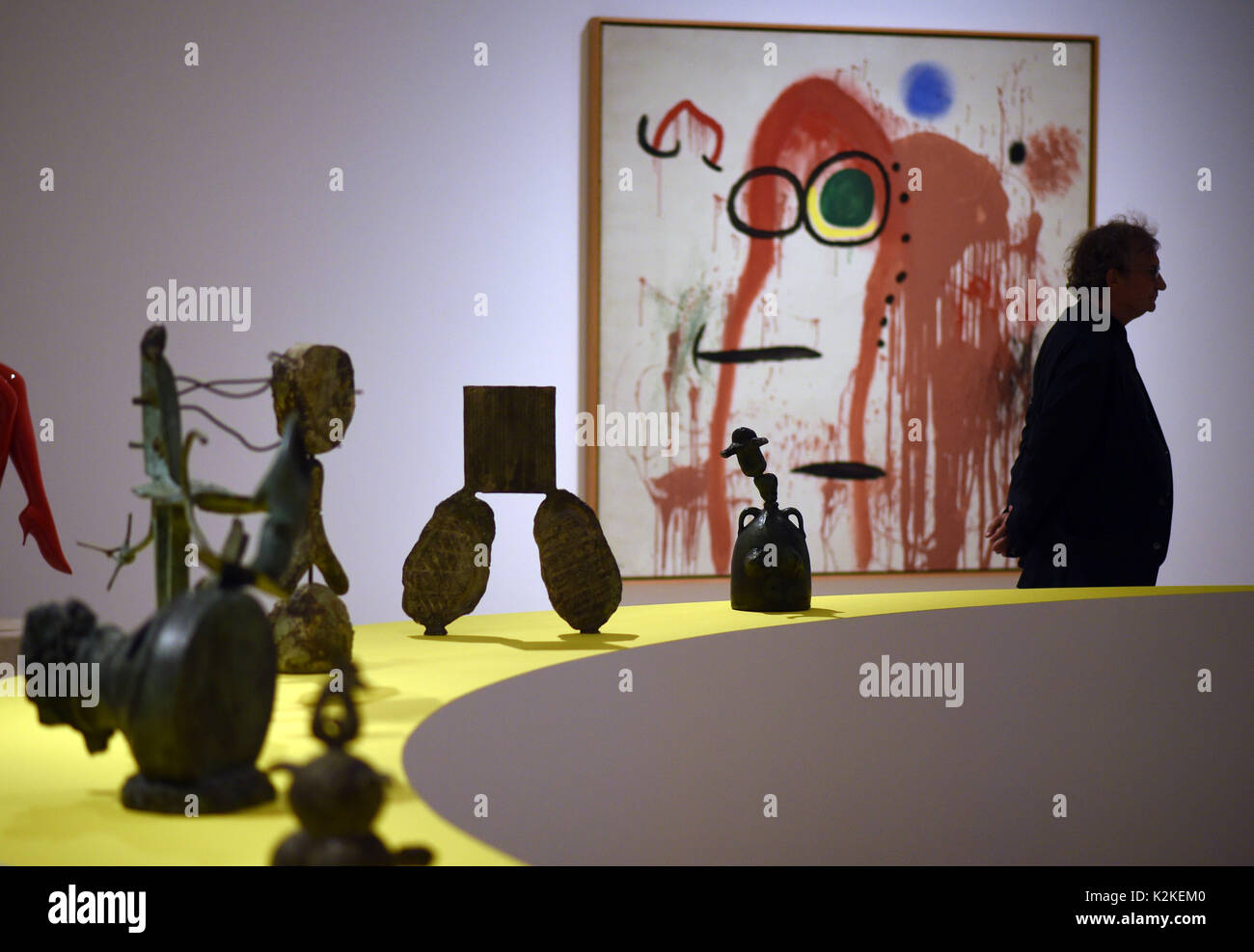 Brueh, Germany. 31st Aug, 2017. The sculpture 'Woman and Bird' (1967) of Joan Miró can be seen behind a row of smaller figures at the exhibition 'Miró - World of Monsters' at the Max Ernst Museum in Brueh, Germany, 31 August 2017. The exhibition will open on the 3rd of September 2017. Photo: Henning Kaiser/dpa/Alamy Live News Stock Photo
