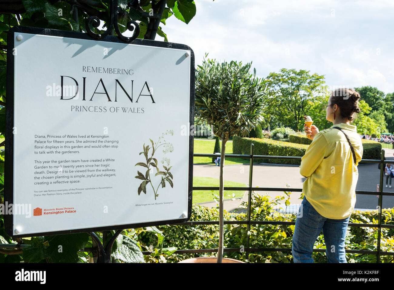 Well-wishers visit the White Garden at Kensington Palace to commemorate and pay tribute to Princess Diana, twenty years after her death. Stock Photo