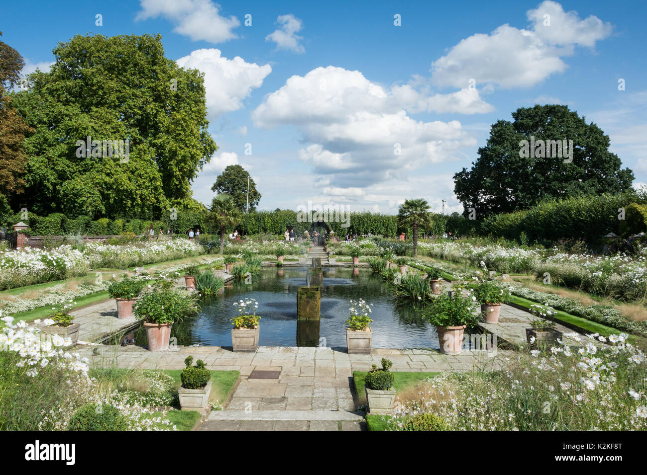 Well-wishers visit the White Garden at Kensington Palace to commemorate and pay tribute to Princess Diana, twenty years after her death. Stock Photo