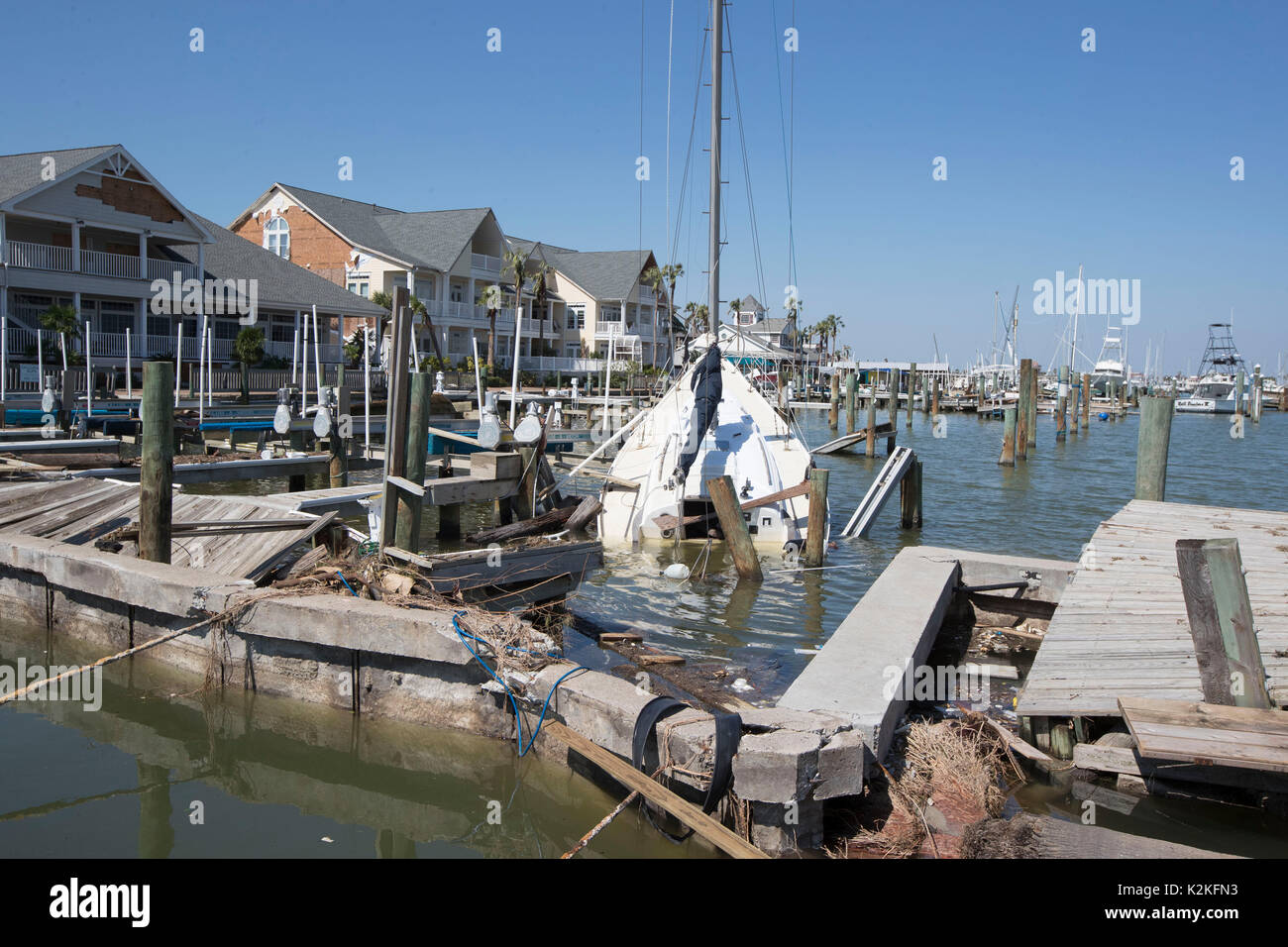 Port Aransas, Texas USA. 30th Aug, 2017. Docks and pleasure crafts extensively damaged by