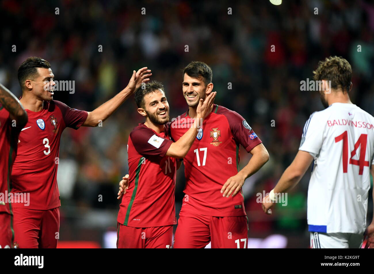 Porto, Portugal. 31st Aug, 2017. Nelson Oliveira (2nd R) of Portugal celebrates after scoring with his teammates during the FIFA World Cup 2018 Qualifiers Group B match between Portugal and Faroe Islands at Bessa stadium in Porto, Portugal, on Aug. 31, 2017. Portugal won 5-1. Credit: Zhang Liyun/Xinhua/Alamy Live News Stock Photo