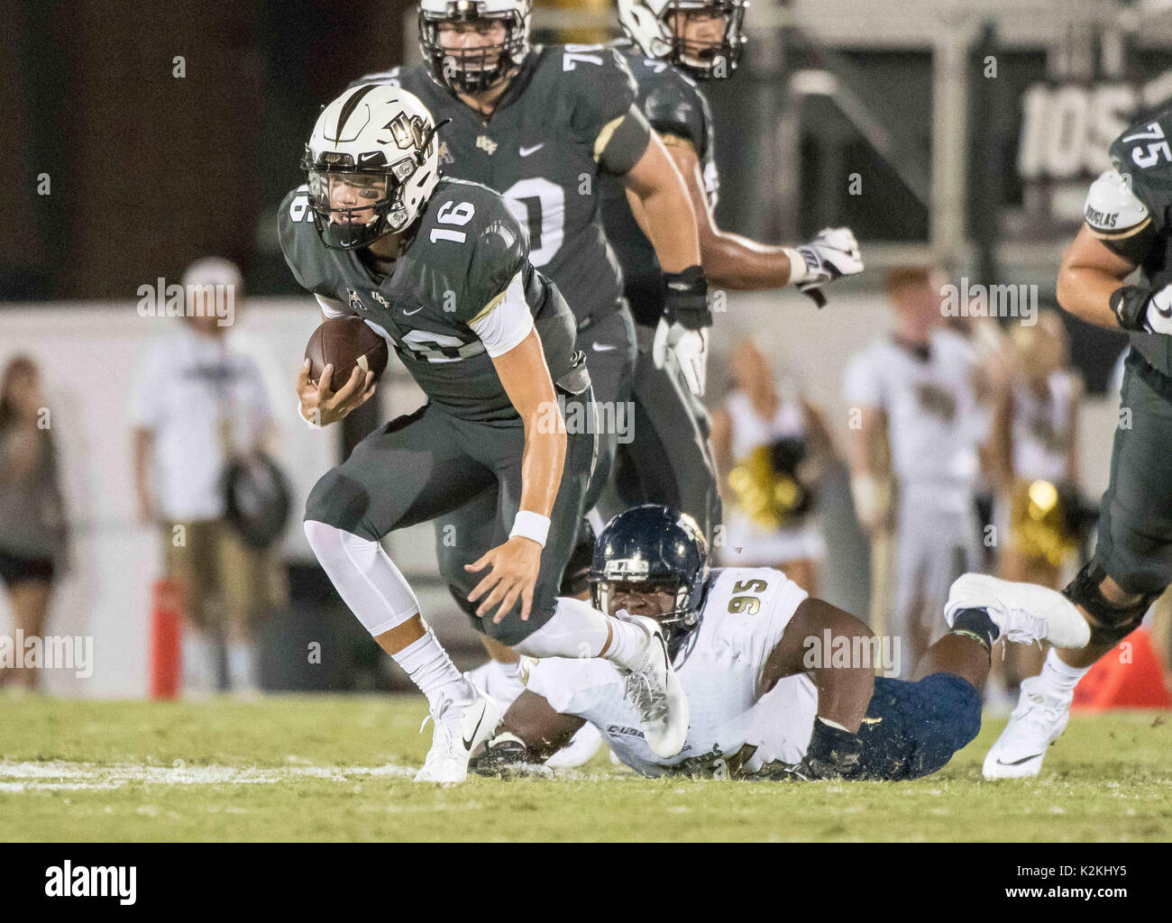 August 31, 2017 - Orlando, FL, U.S: UCF Knights quarterback Noah Vedral (16) during NCAA football game between FIU Golden Panthers and the UCF Knights at Spectrum Stadium in Orlando, Fl. Romeo T Guzman/CSM. Stock Photo