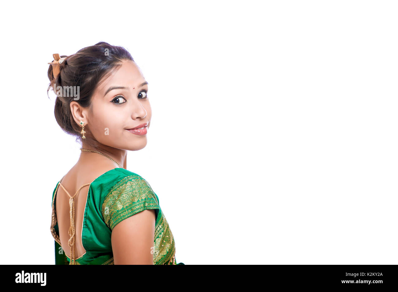 Happy young beautiful traditional Indian woman in traditional saree Stock Photo