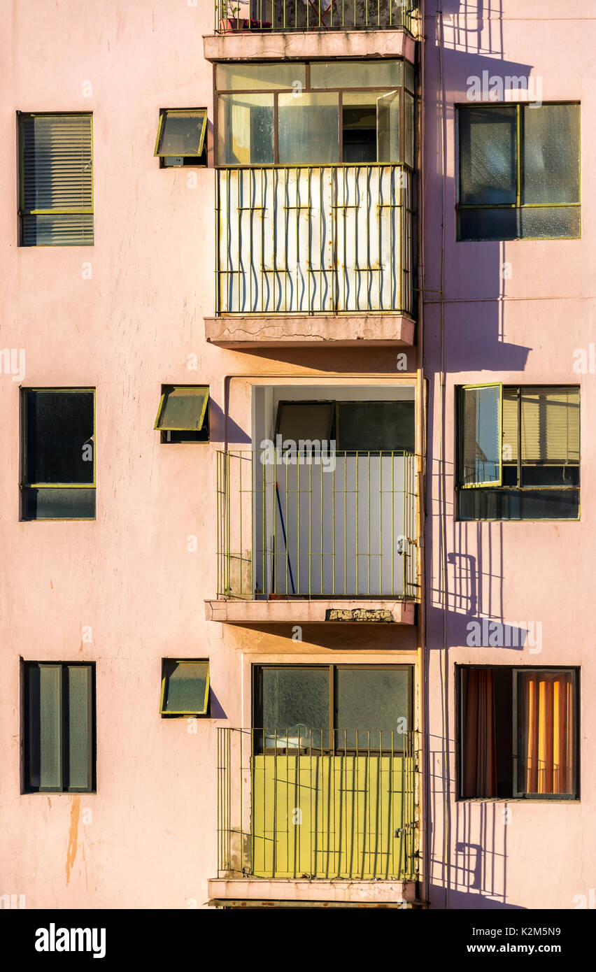 Vertical view of three balconies in an apartment building in Valparaiso ...