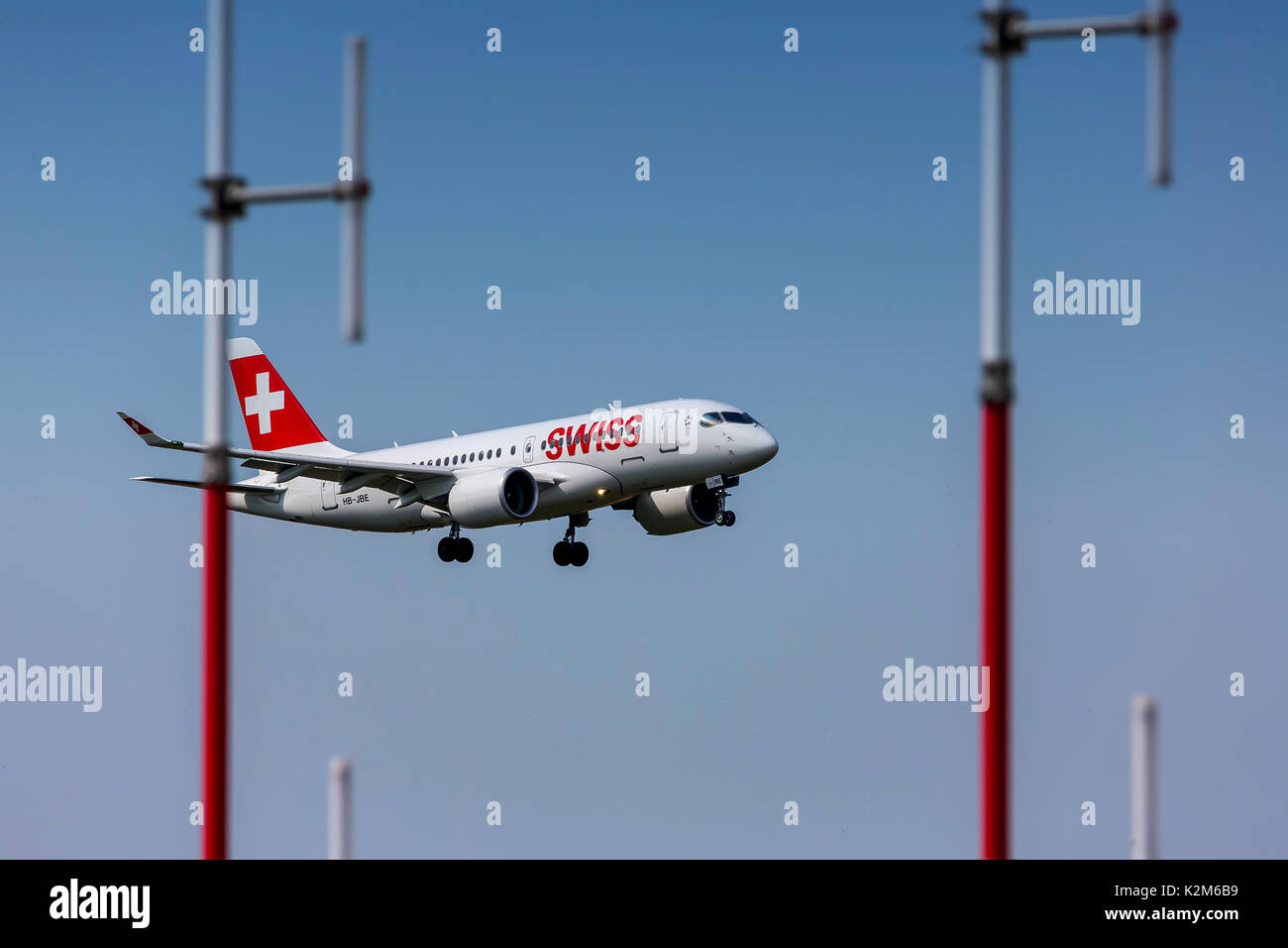 Zurich Airport, ZRH, landing plane. Aircraft registration:  HB-JBE, Swiss, Bombardier CSeries CS100. Stock Photo