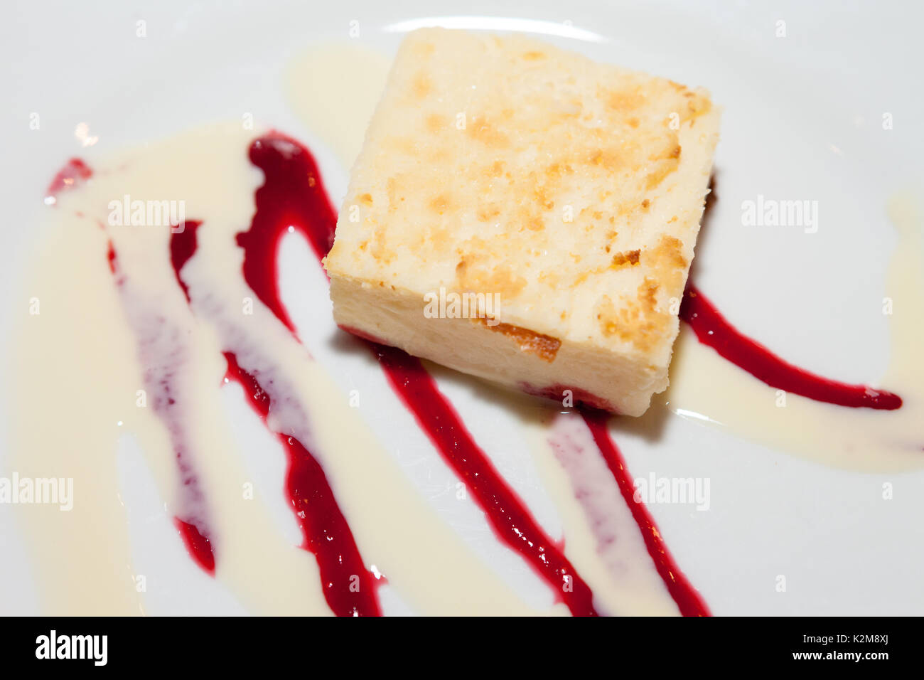 Cheese cake with syrup Stock Photo