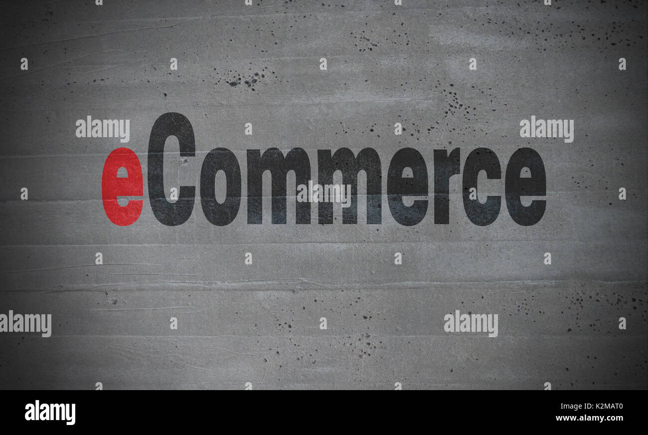 eCommerce on concrete wall concept background. Stock Photo