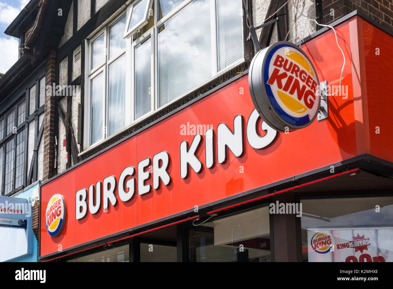 Fascia and sign on a branch of Burger King fast food restaurant in Orpington. Stock Photo