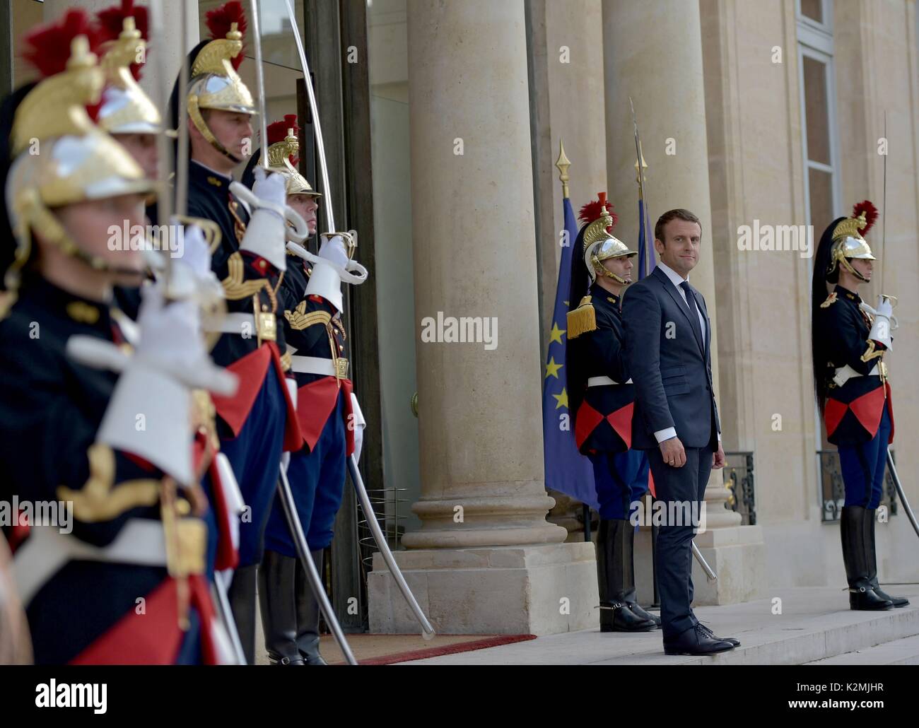 French President Emmanuel Macron waits to welcome Mexican President Enrique Pena Nieto for arrival ceremony at the Elysee Palace July 7, 2017 in Paris, France. Stock Photo