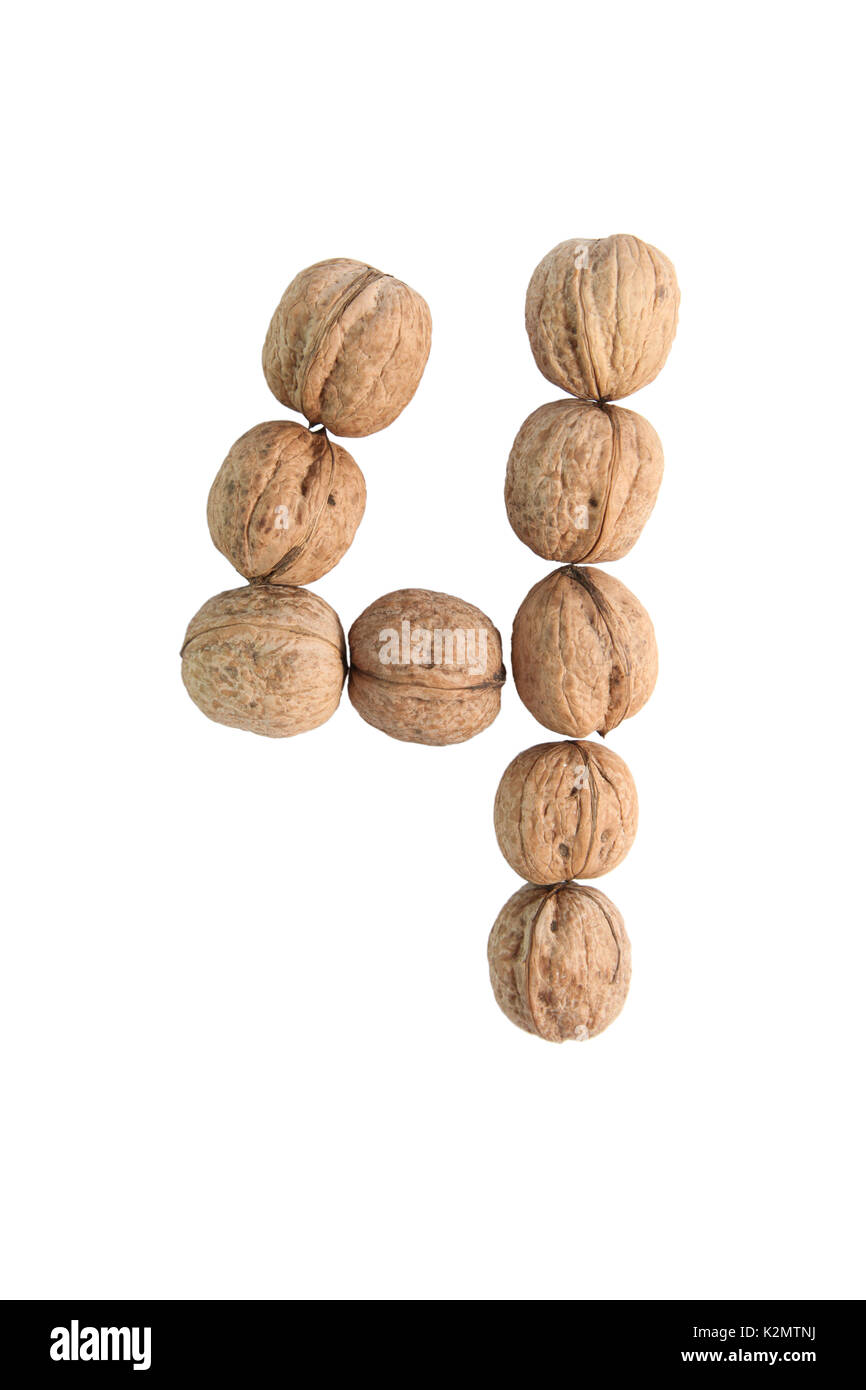 Four walnuts isolated white background hi-res stock photography and ...