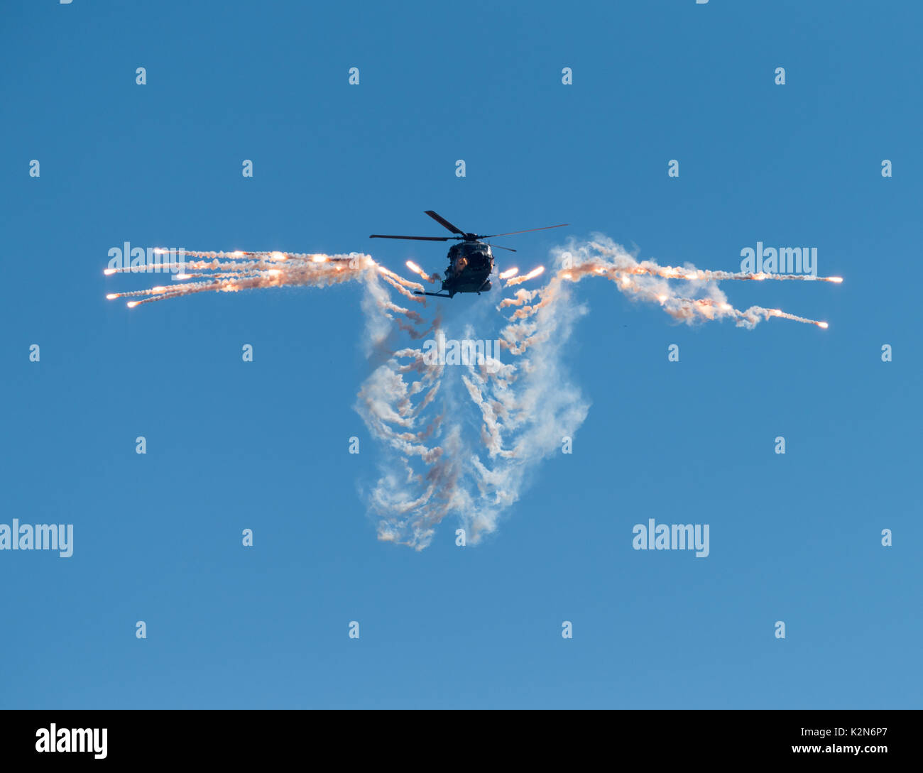 Helsinki, Finland - 9 June 2017: Finnish Army NH90 helicopter shooting out flares at the Kaivopuisto Air Show in Helsinki, Finland on 9 June 2017. Stock Photo