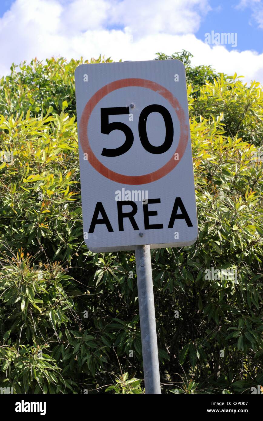 Close up of Street sign 50 Area indicating speed limit of 50 kph Stock Photo