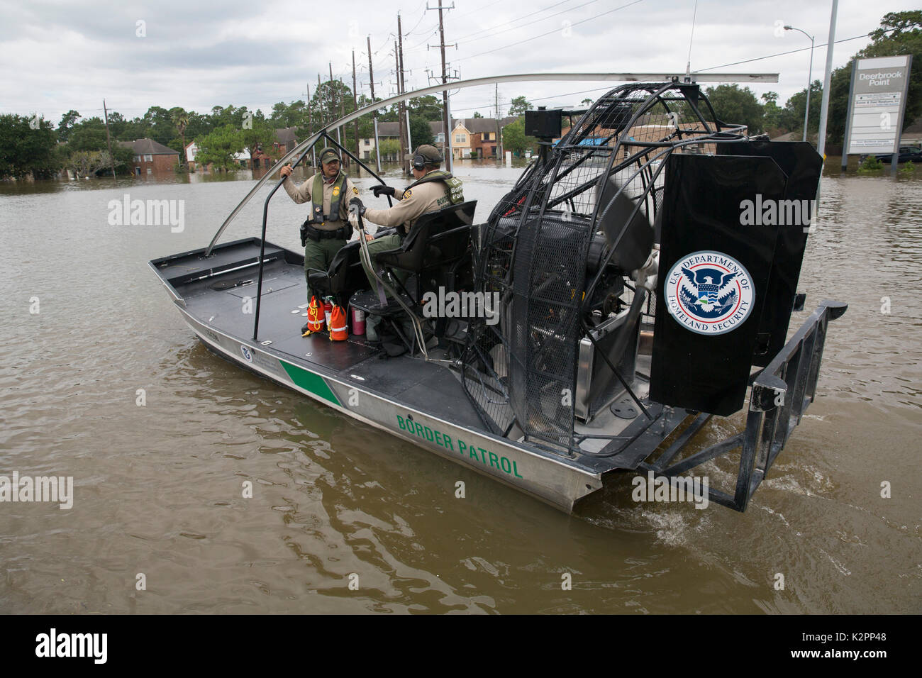 Houston, United States. 30th Aug, 2017. U.S Border Patrol riverine agents on an air boat patrol a neighborhood flooded by rising waters to assist in evacuating resident in the aftermath of Hurricane Harvey August 30, 2017 in Houston, Texas. Credit: Planetpix/Alamy Live News Stock Photo