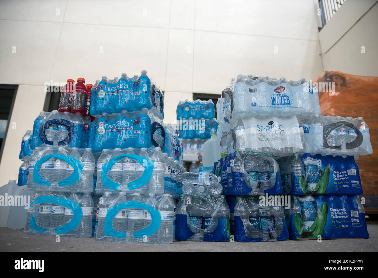 West Palm Beach, Florida, USA. 31st Aug, 2017. Stacks of bottles of water meant for Houston relief efforts await being loaded into trailers at the Ballpark of the Palm Beaches in West Palm Beach, Fla., on Thursday, August 31, 2017. The Houston Astros baseball team is praising Palm Beach County residents for a greater-than-expected response to the team's request for donations to help victims of Hurricane Harvey. The unexpected response has prompted the team to send in a second truck to carry supplies to Texas next week. Credit: Andres Leiva/The Palm Beach Post/ZUMA Wire/Alamy Live News Stock Photo