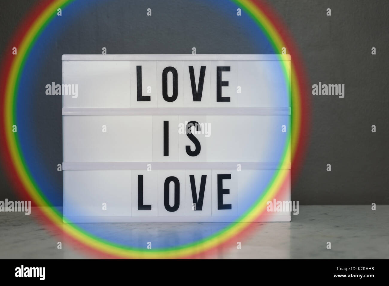lightbox with the phrase "love is love" Stock Photo