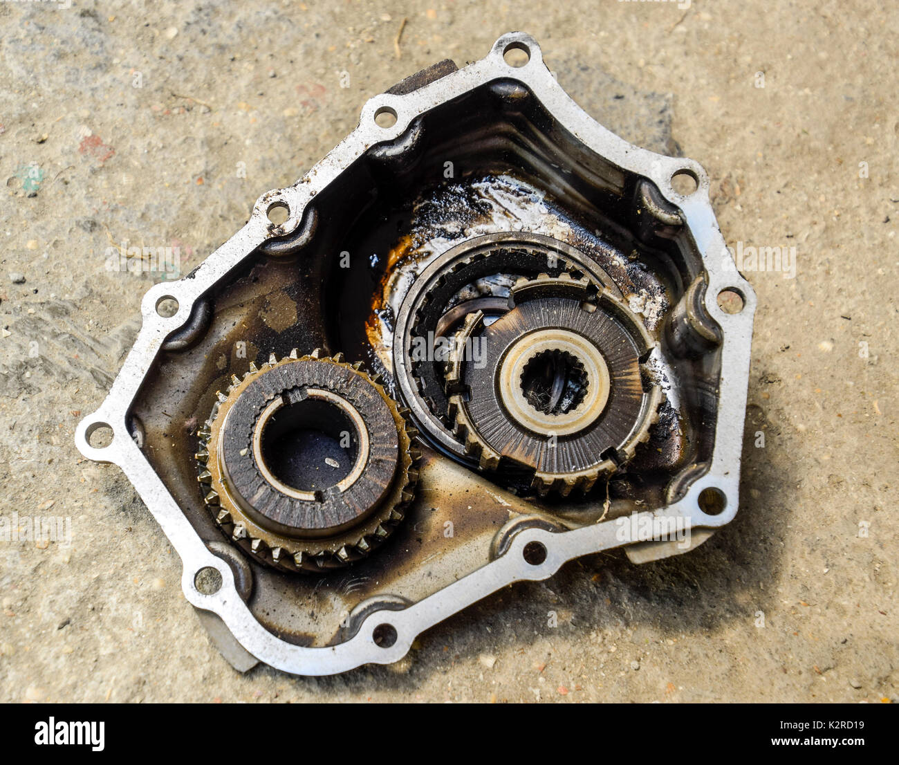Gear with bearings and gearbox housing. Dismantled box car transmissions. The gears on the shaft of a mechanical transmission Stock Photo