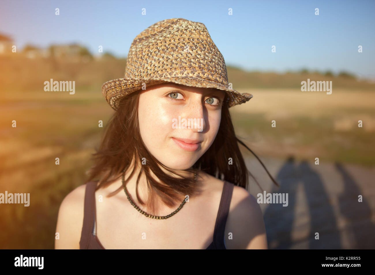 portrait of a young girl in a straw hat in the Park Stock Photo Alamy