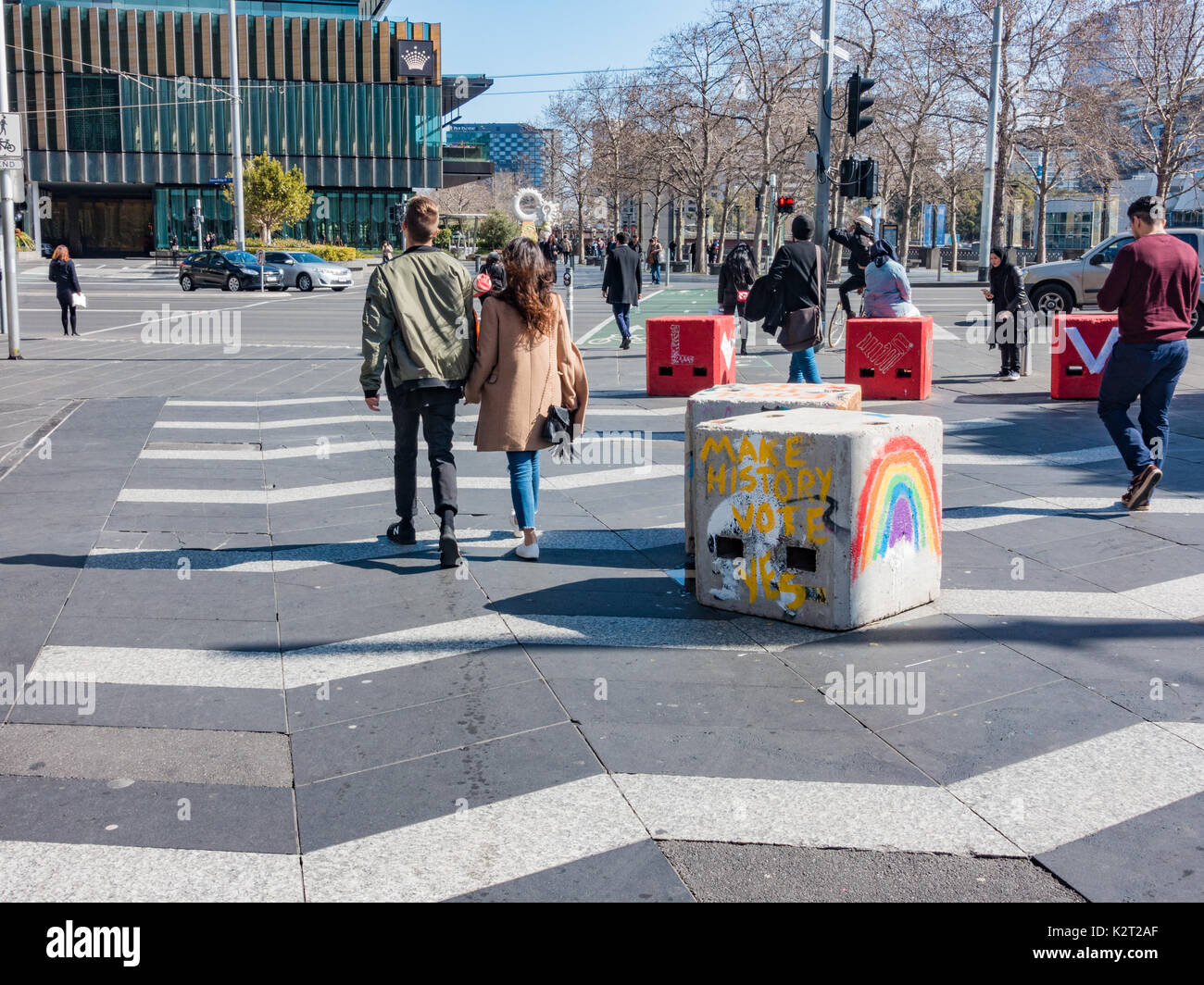 Anti terrorism bollards decorated with same sex marriage messages in South Bank, Melbourne, Australia Stock Photo