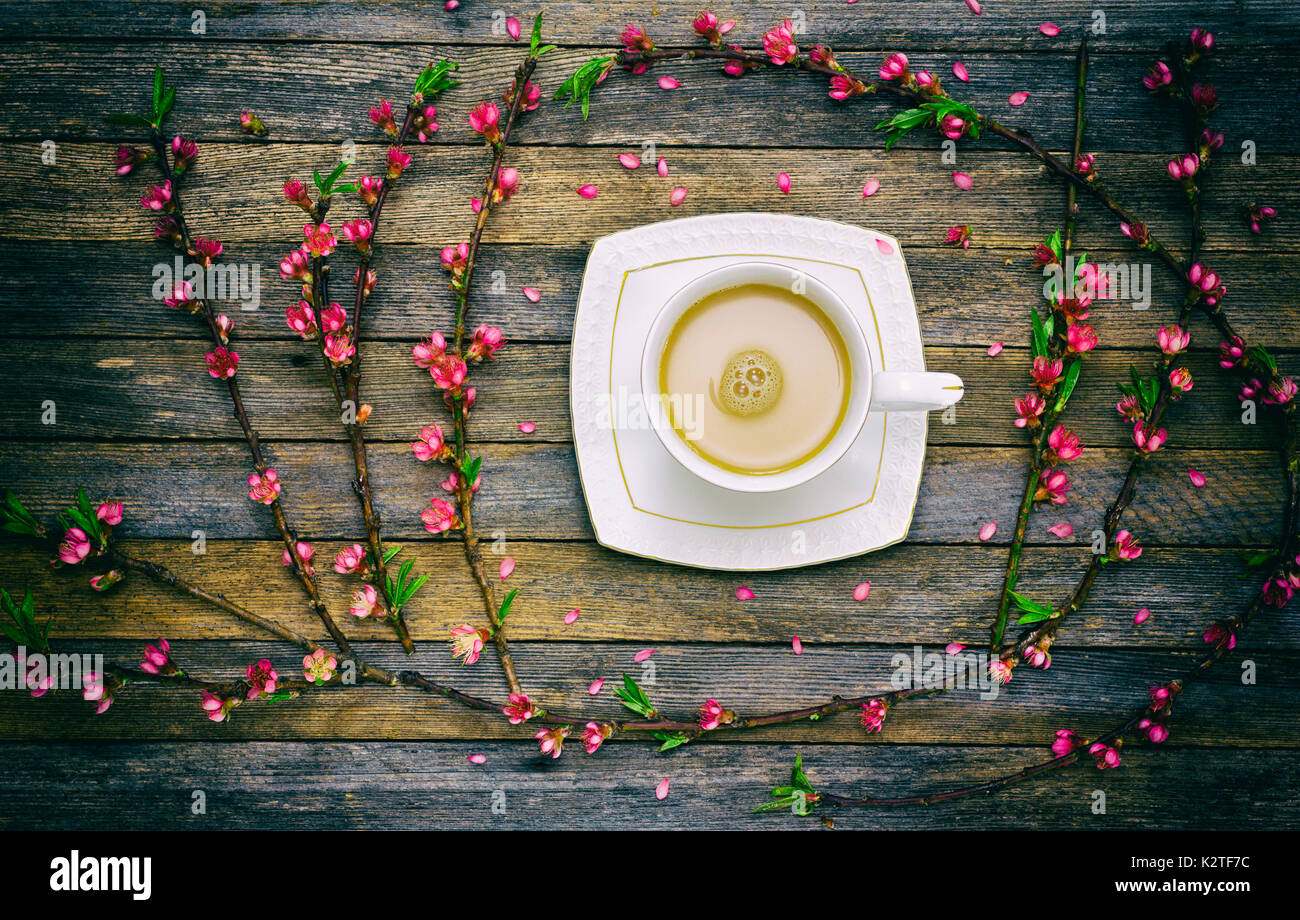 Cup Of Coffee And Spring Flowers ( Peach) On Pink Wooden Table. Stock  Photo, Picture and Royalty Free Image. Image 70289623.