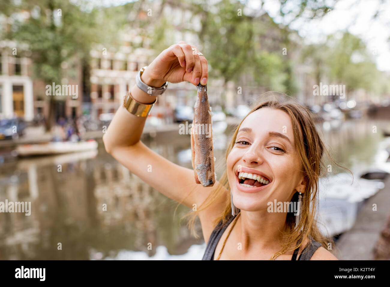 Woman with harring in Amsterdam Stock Photo