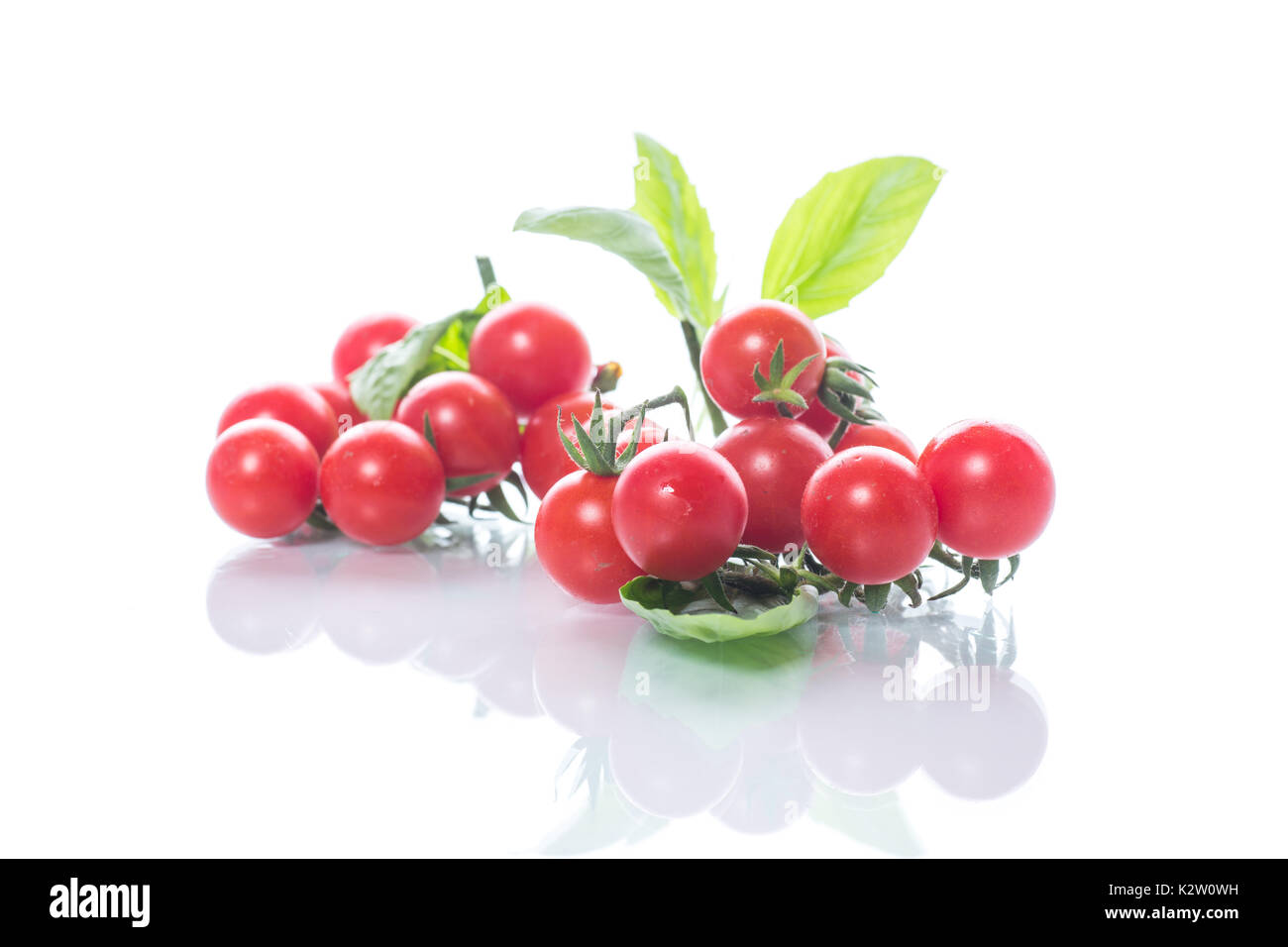 fresh organic cherry tomatoes isolated on white background Stock Photo ...