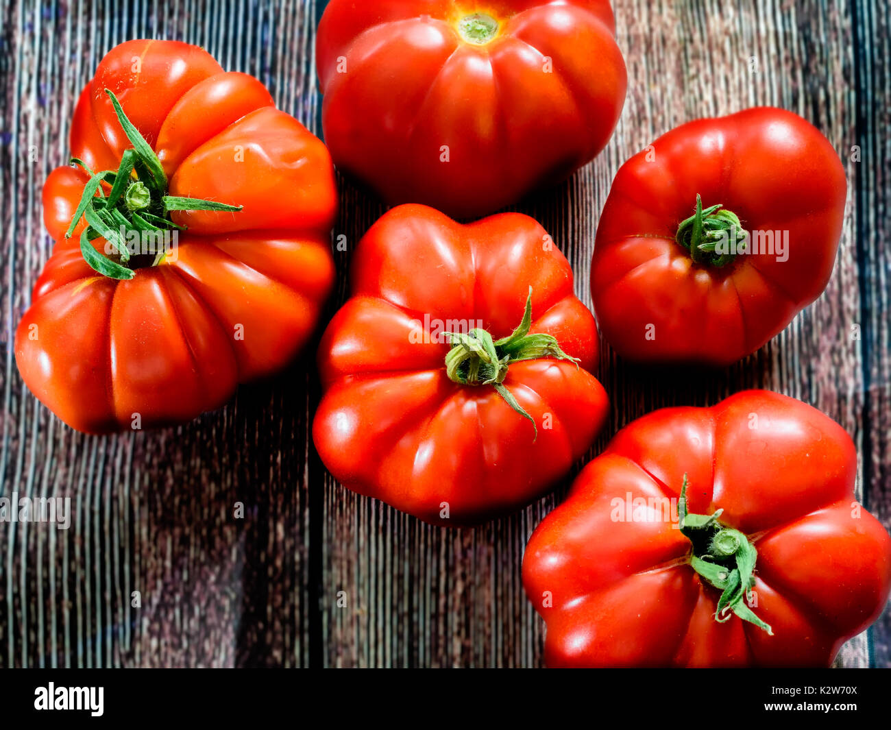 Fresh red Marmande RAF red tomatoes Stock Photo