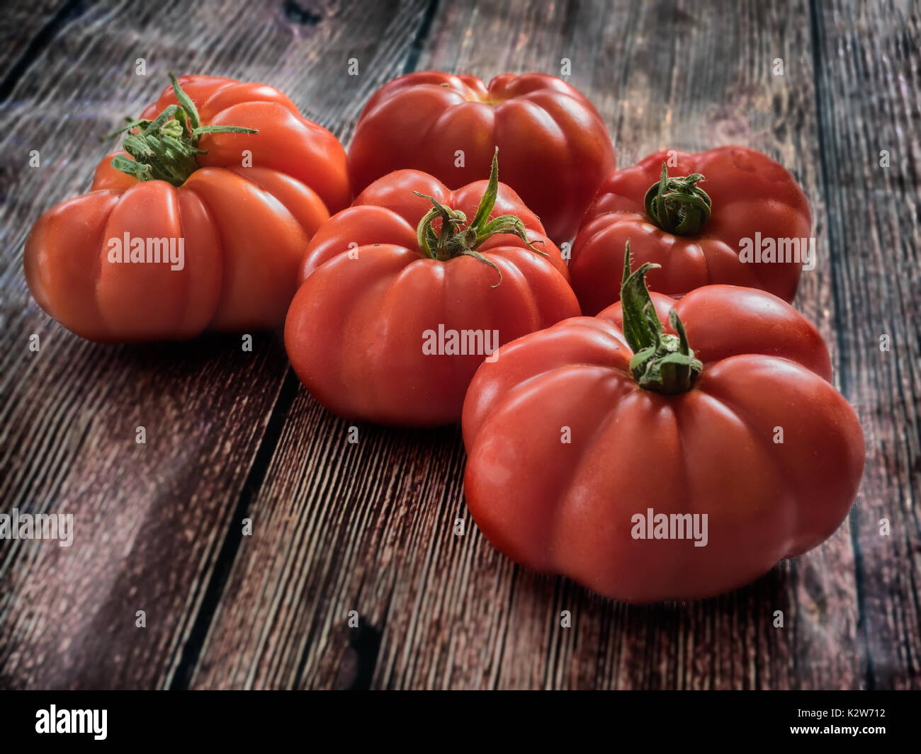 Fresh red Marmande RAF red tomatoes Stock Photo