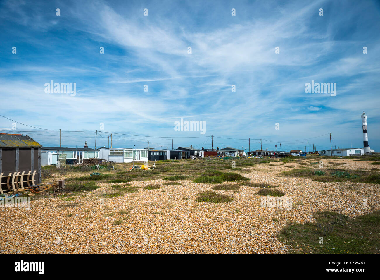 Old railway carriage houses on the Dungeness headland, Kent, UK Stock Photo
