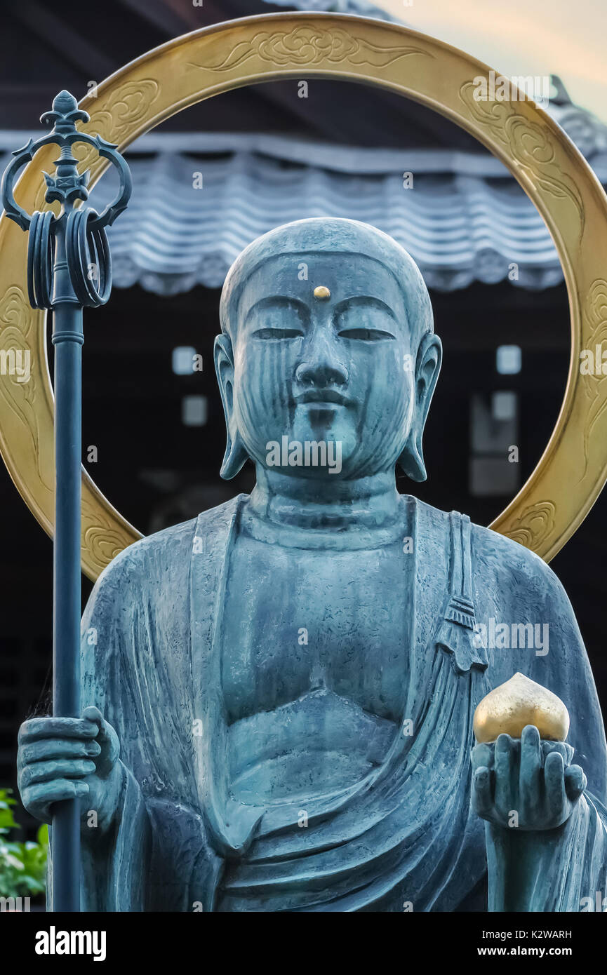 Bronze Buddha Statue in front of Daiun-in Temple in Kyoto                                                                                          KYO Stock Photo
