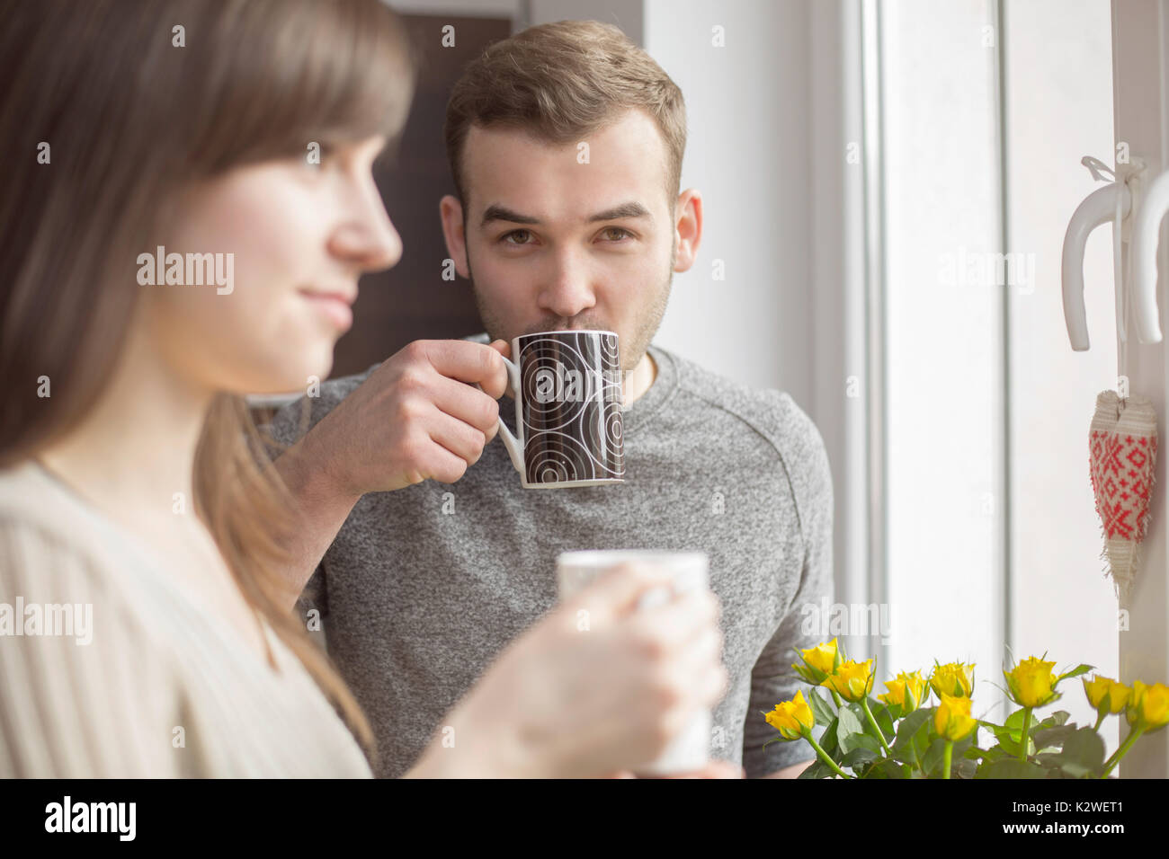 Attractive man and woman with coffee Stock Photo