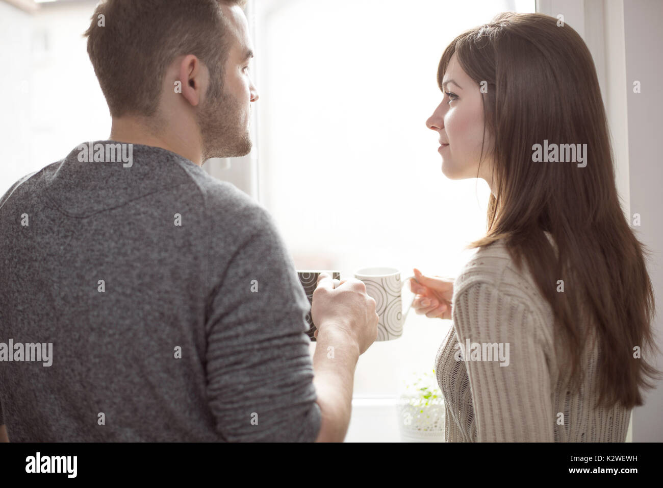 Young married people having coffee Stock Photo