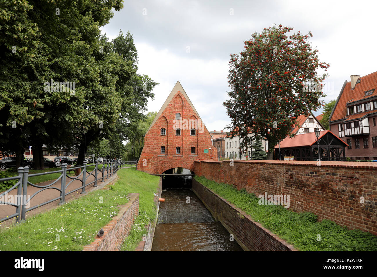 The Mały Młyn, a mill built over a narrow waterway in the centre of Gdansk, Poland, photographed on 20 August 2017 Stock Photo