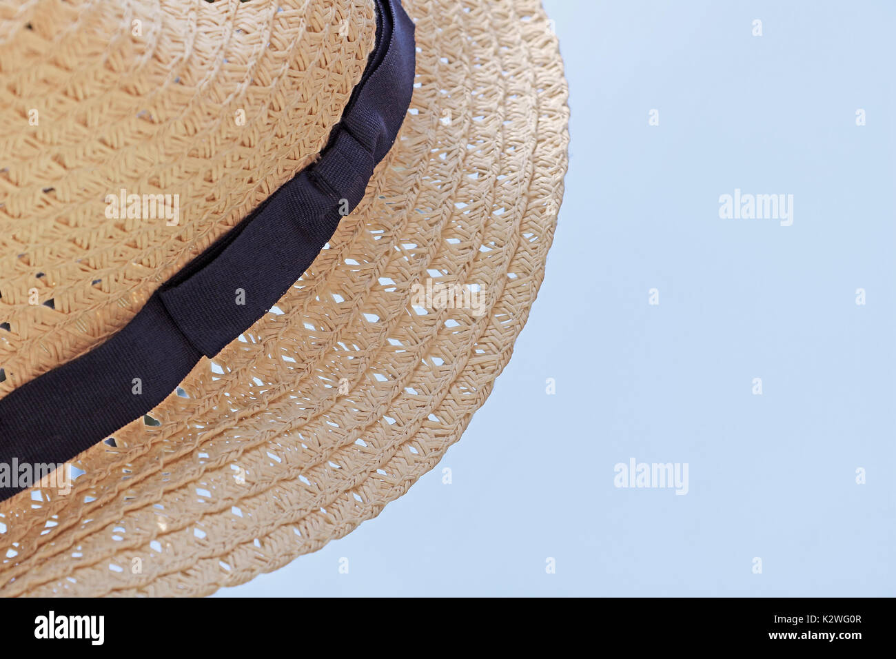 Straw hat on the sky background Stock Photo - Alamy