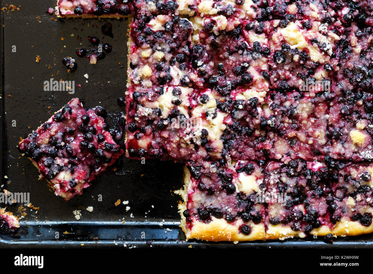 Homemade fruit and curd cheese kolach on baking tray from above. Stock Photo