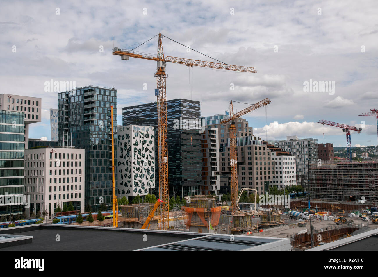 Construction work going on around the Barcode development in Bjørvika, central Oslo, as seen from the Oslo Opera House. Stock Photo