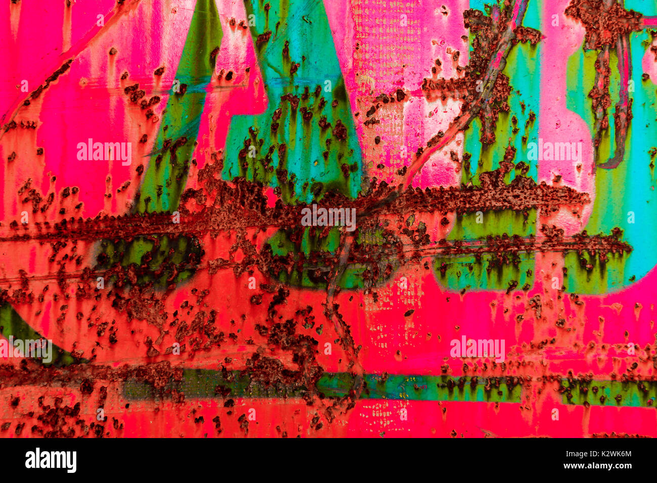 Abstract of rusted metal painted pink and green Stock Photo Alamy